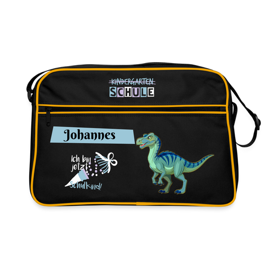 umhaengetasche-40x28cm-schwarz-mit-goldenen-kontraststreifen-mit-2-reissverschluessen-und-umhaengegurt-design-dinosaurier-in-blau-gruen-plus-schultuete-mit-schriftzug-ich-bin-jetzt-ein-schulkind-daneben-der-personalisierte-name-auf-hellblauem-banner
